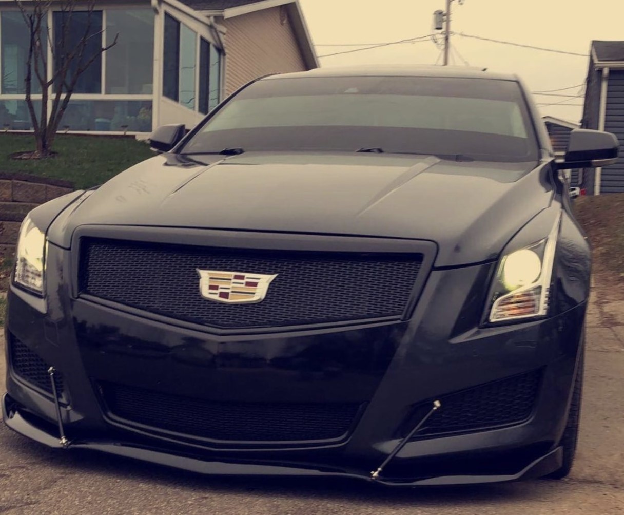 Stealth Elegance: Custom All Black Grille Upgrade for the 2013 Cadillac ATS