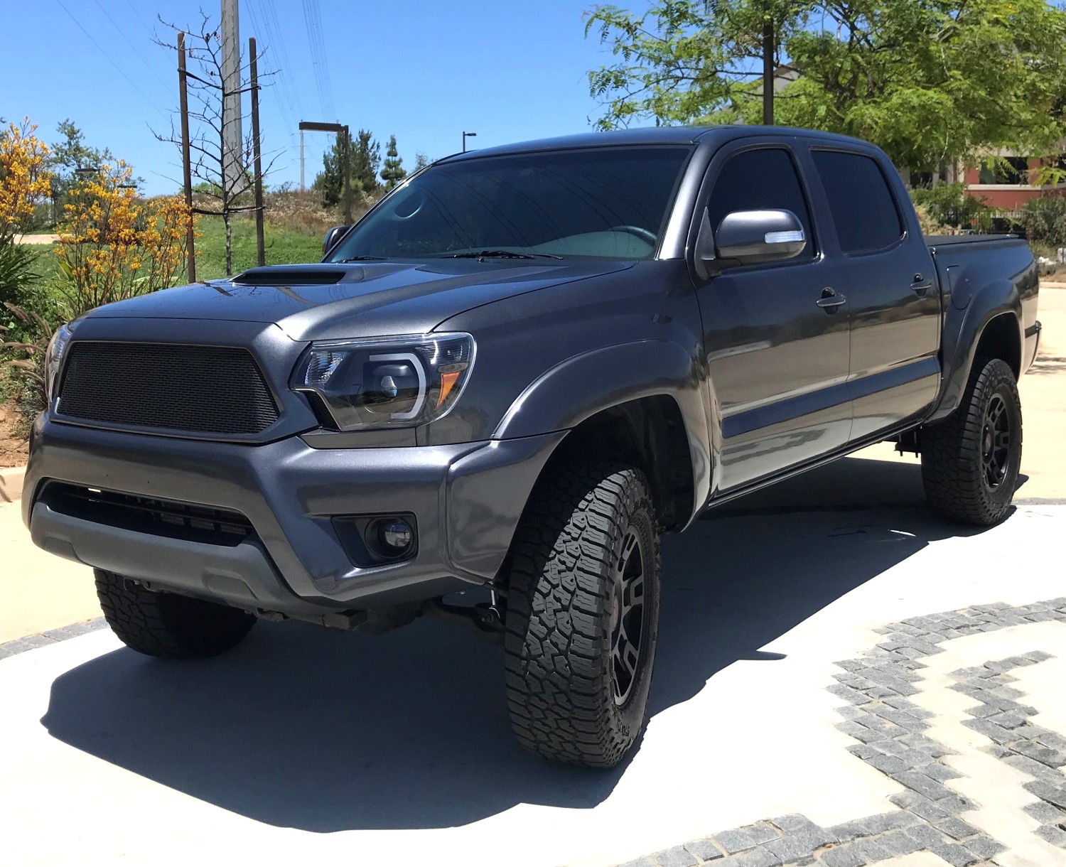 Sleek and Stealthy: Flat Black Grille Mesh Upgrade for 2nd Gen Tacoma