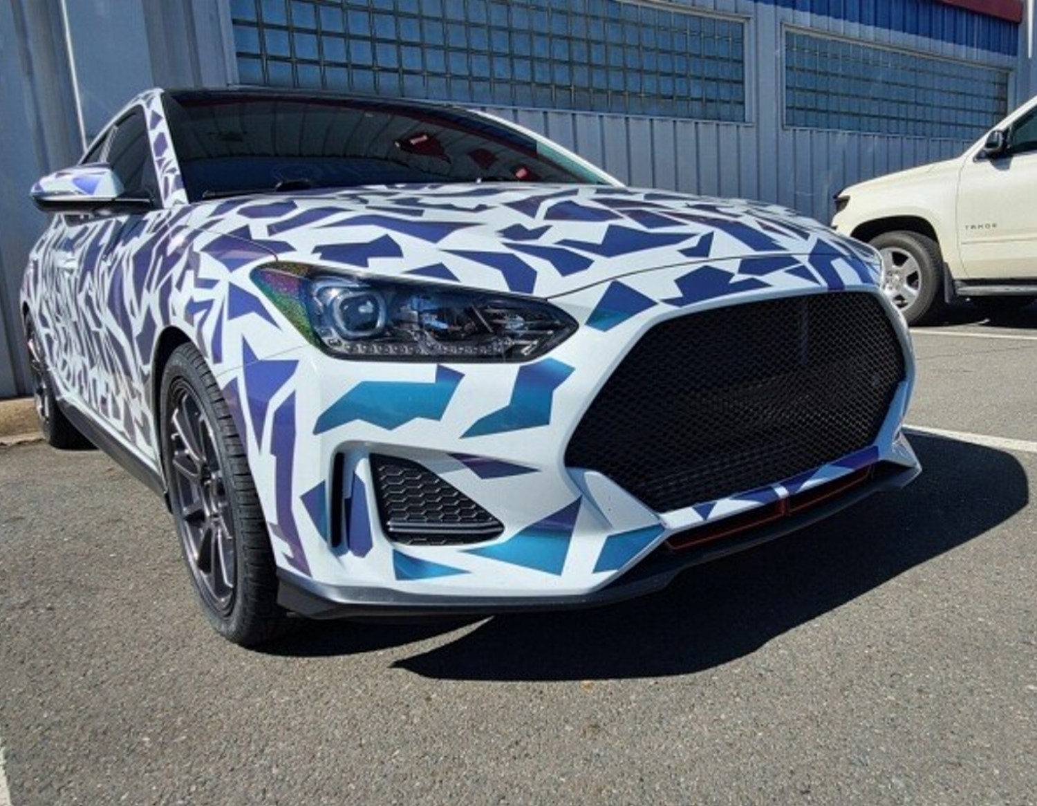 Vinyl Wrapped Hyundai Veloster with Custom Grille: A Bold and Unique Ride