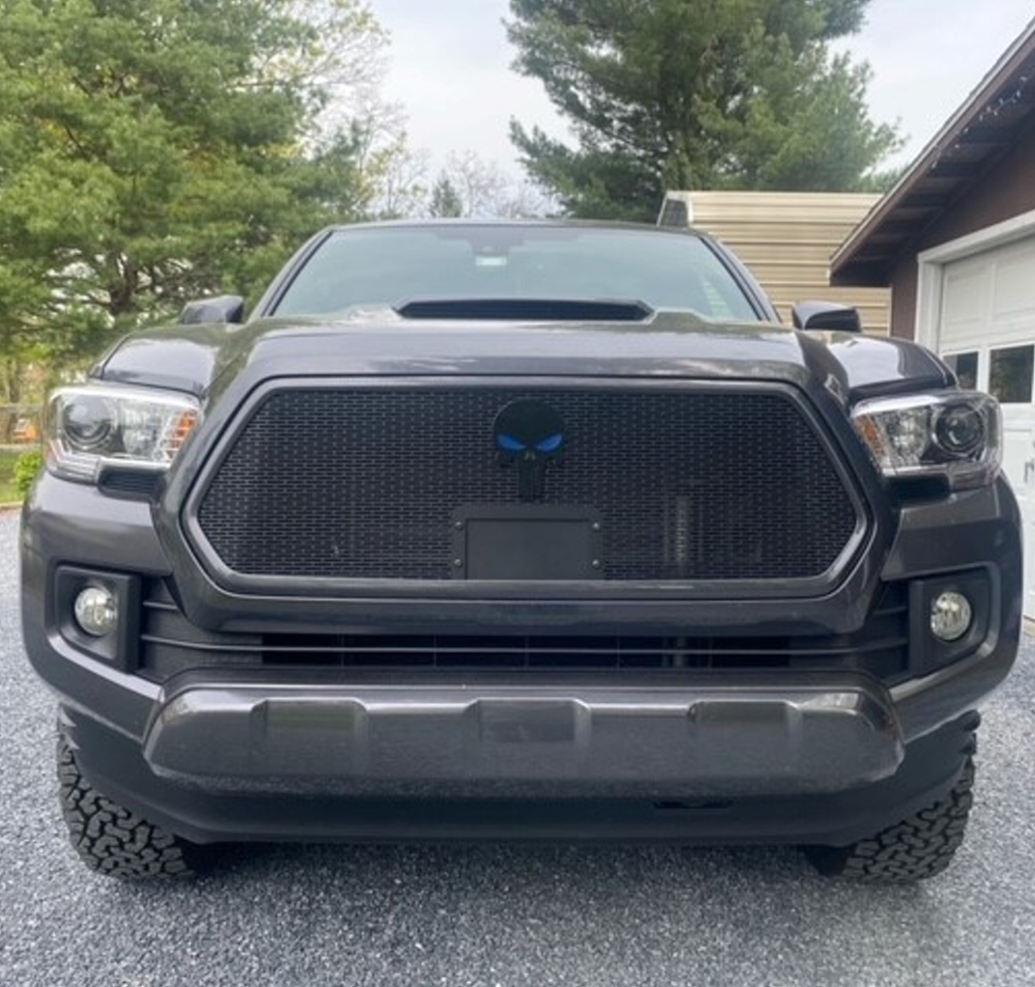 Make a Statement with a Custom Emblem and Grille for Your Tacoma
