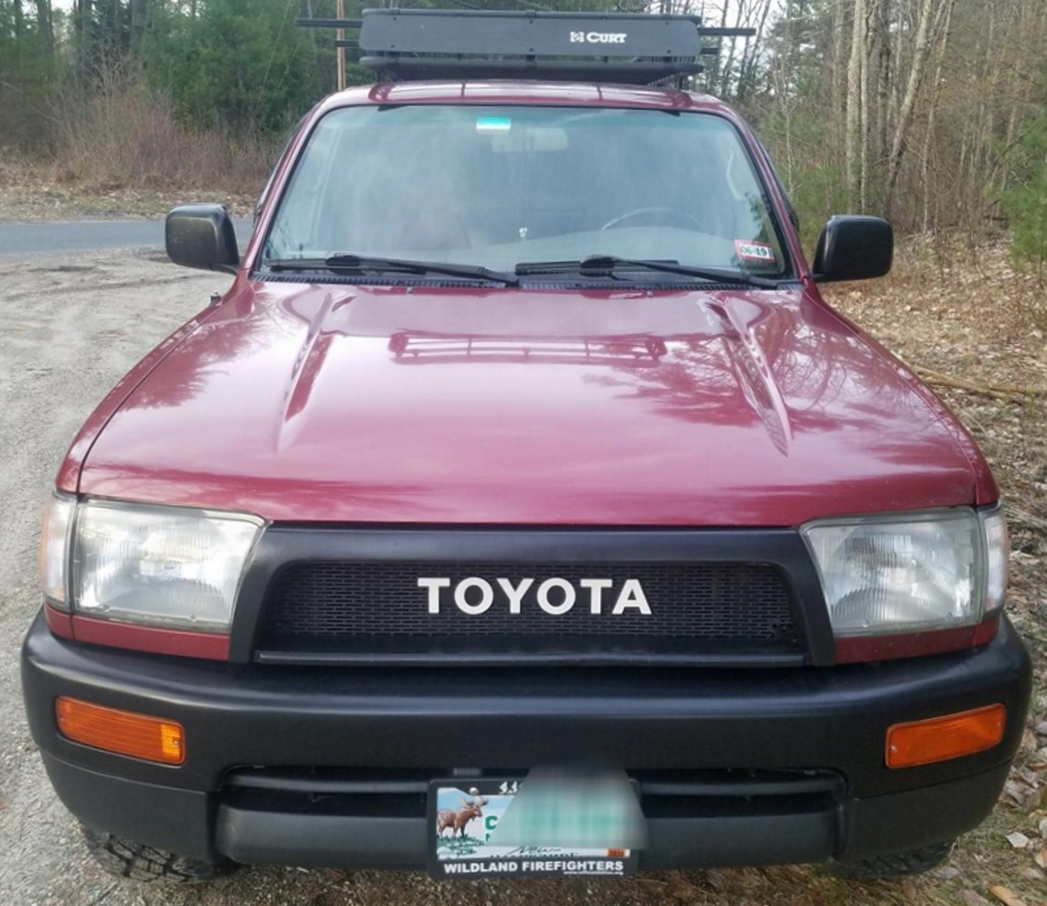 The Ultimate Upgrade: All Black Satoshi Grille Mod with White Toyota Emblem for 3rd Gen 4Runner