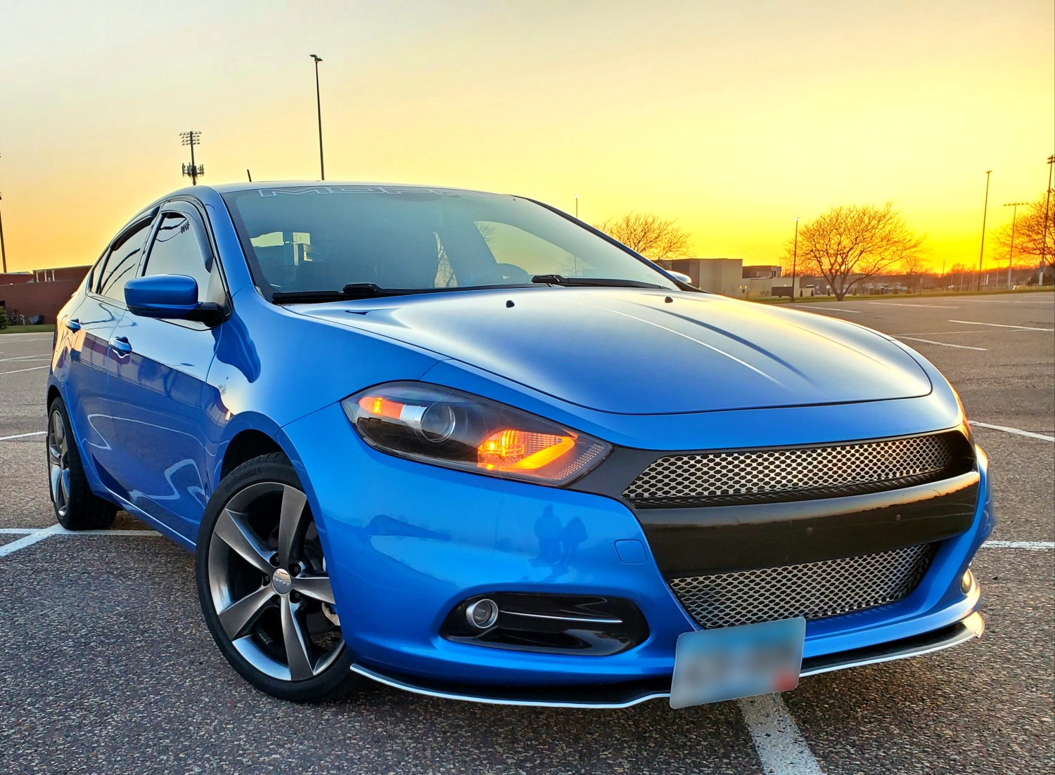 A Beautiful Sunset with a Stunning Custom Grille on a Dodge Dart