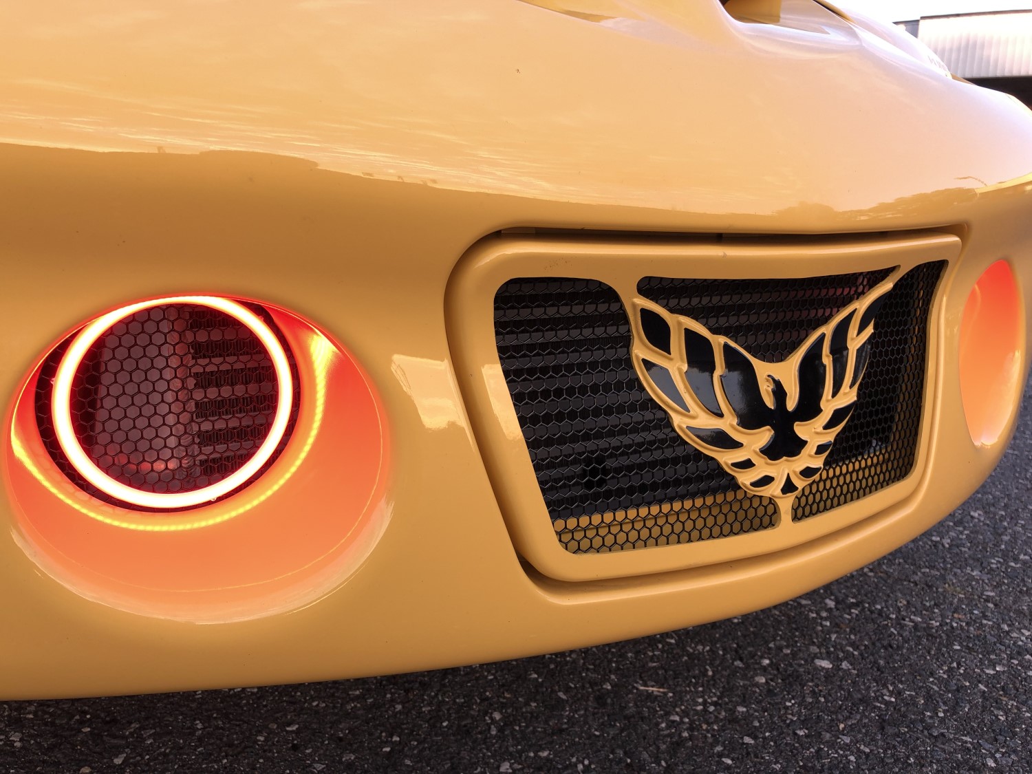 Fiery Style Upgrade: Custom Grille and Lighting for Pontiac Firebird