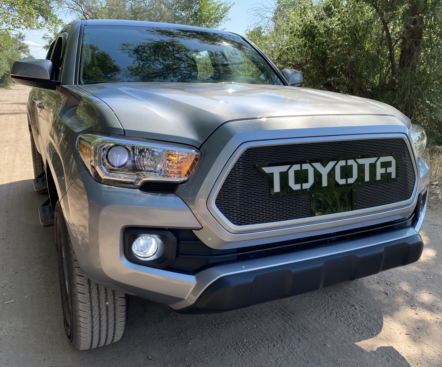 Add Style and Protection to Your 2018+ Toyota Tacoma with a TSS Compatible Color-Matched Grille Upgrade