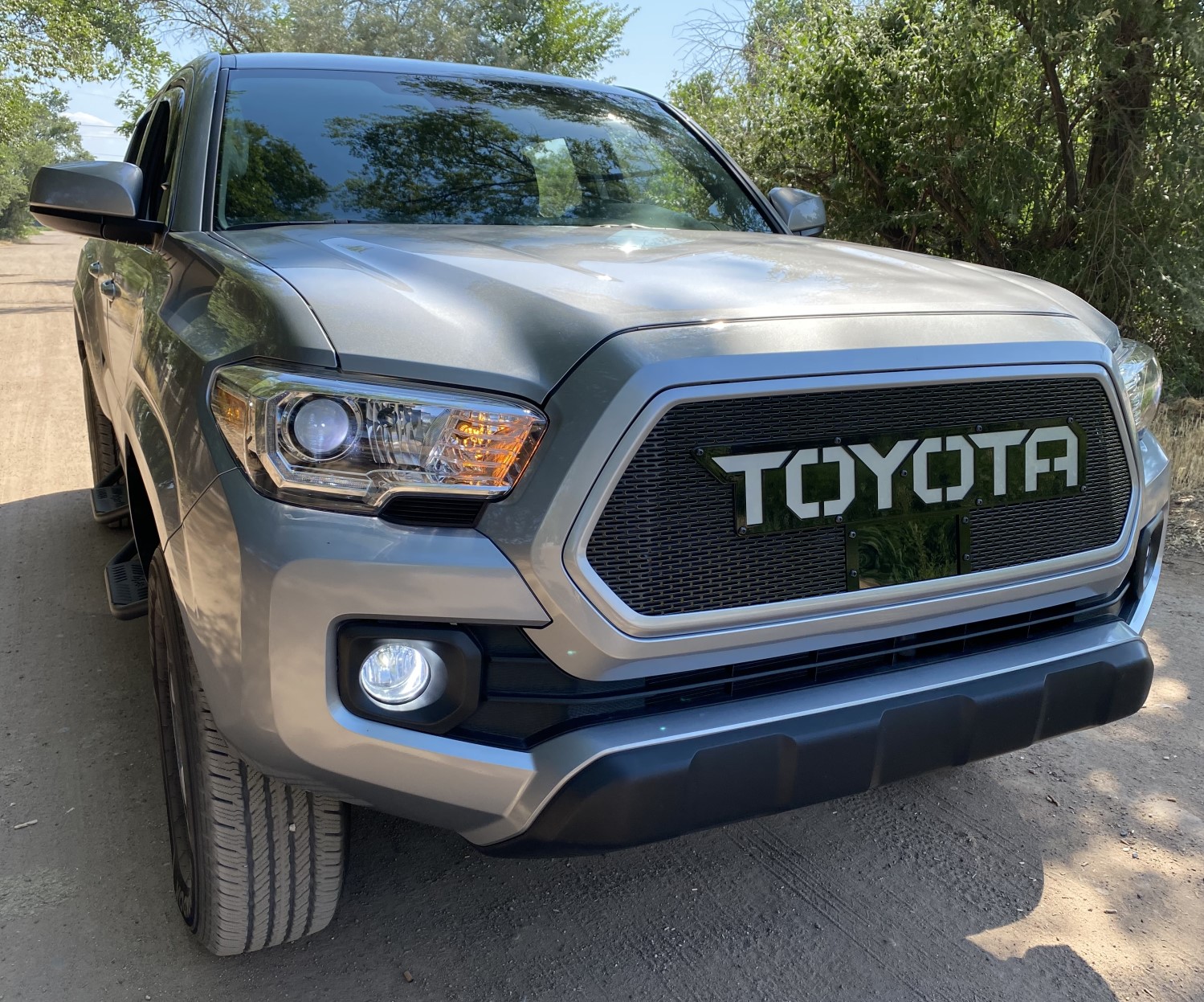 Add Style and Protection to Your 2018+ Toyota Tacoma with a TSS Compatible Color-Matched Grille Upgrade