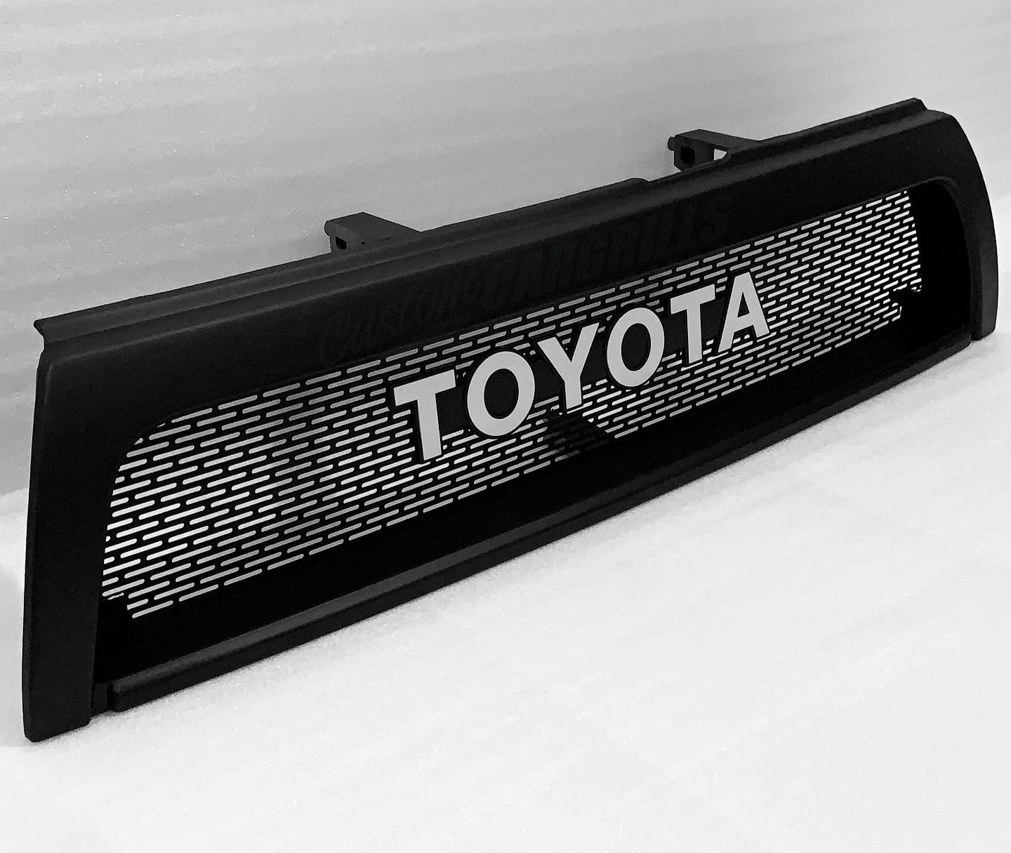 Artisanal Touch: Handmade Grille with White Toyota Emblem for 4Runner