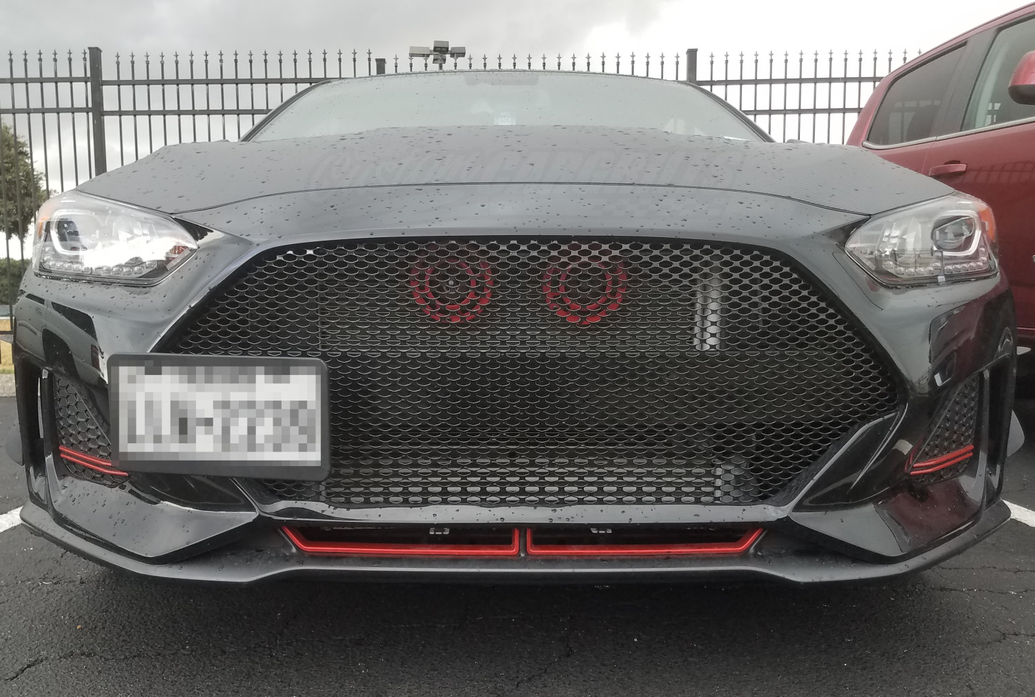 Black Veloster with Custom Mesh Grille and Practical Tow Hook Hole