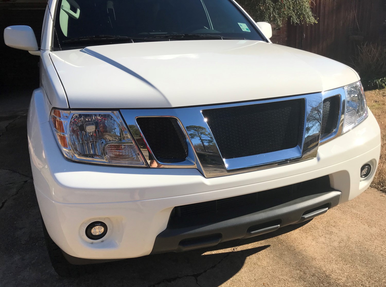 Upgrade Your Off-Road Game: Black Mesh Grille for a More Aggressive Look on Your Nissan Frontier