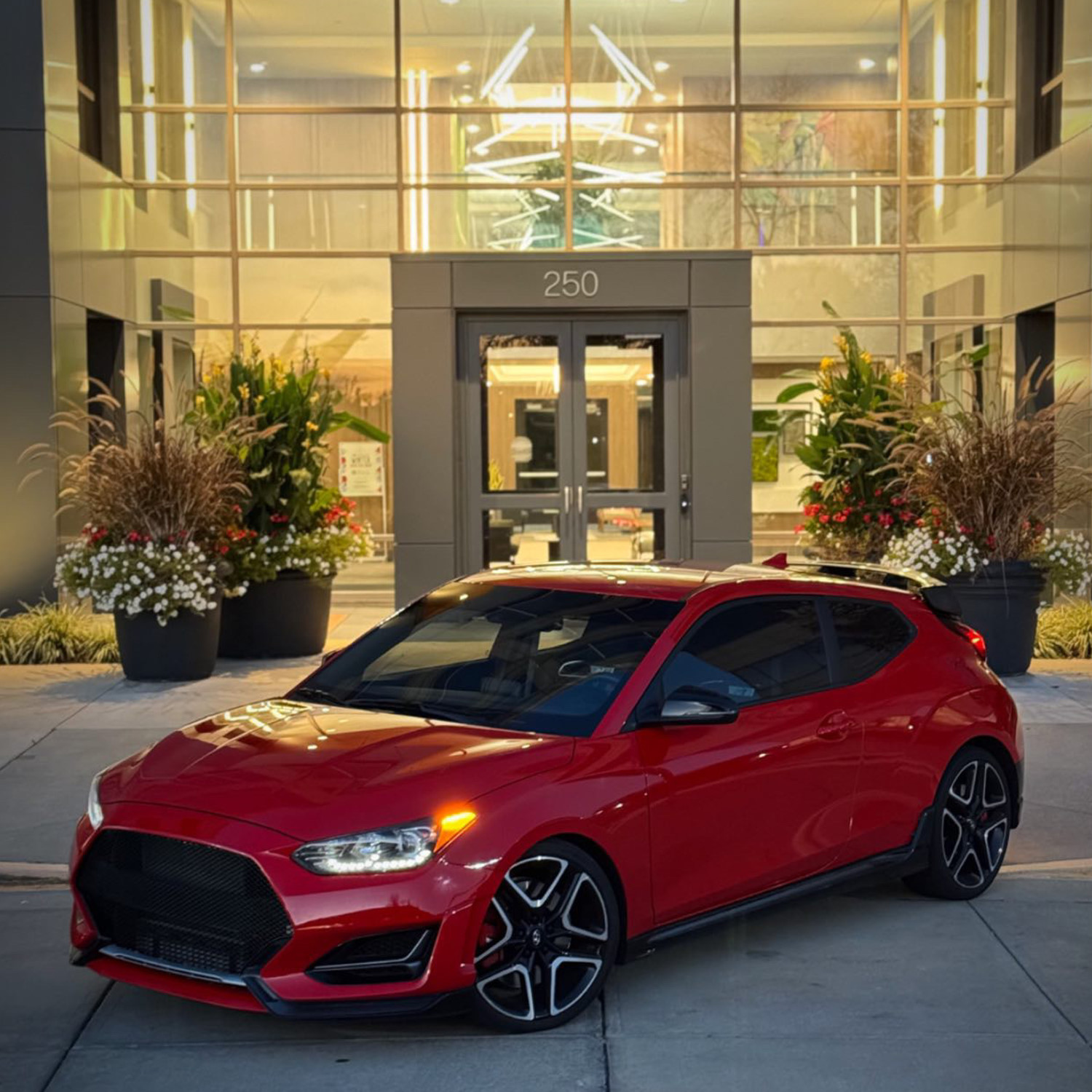 Night time picture taking at its best - Racing Red Veloster N with new mesh grille