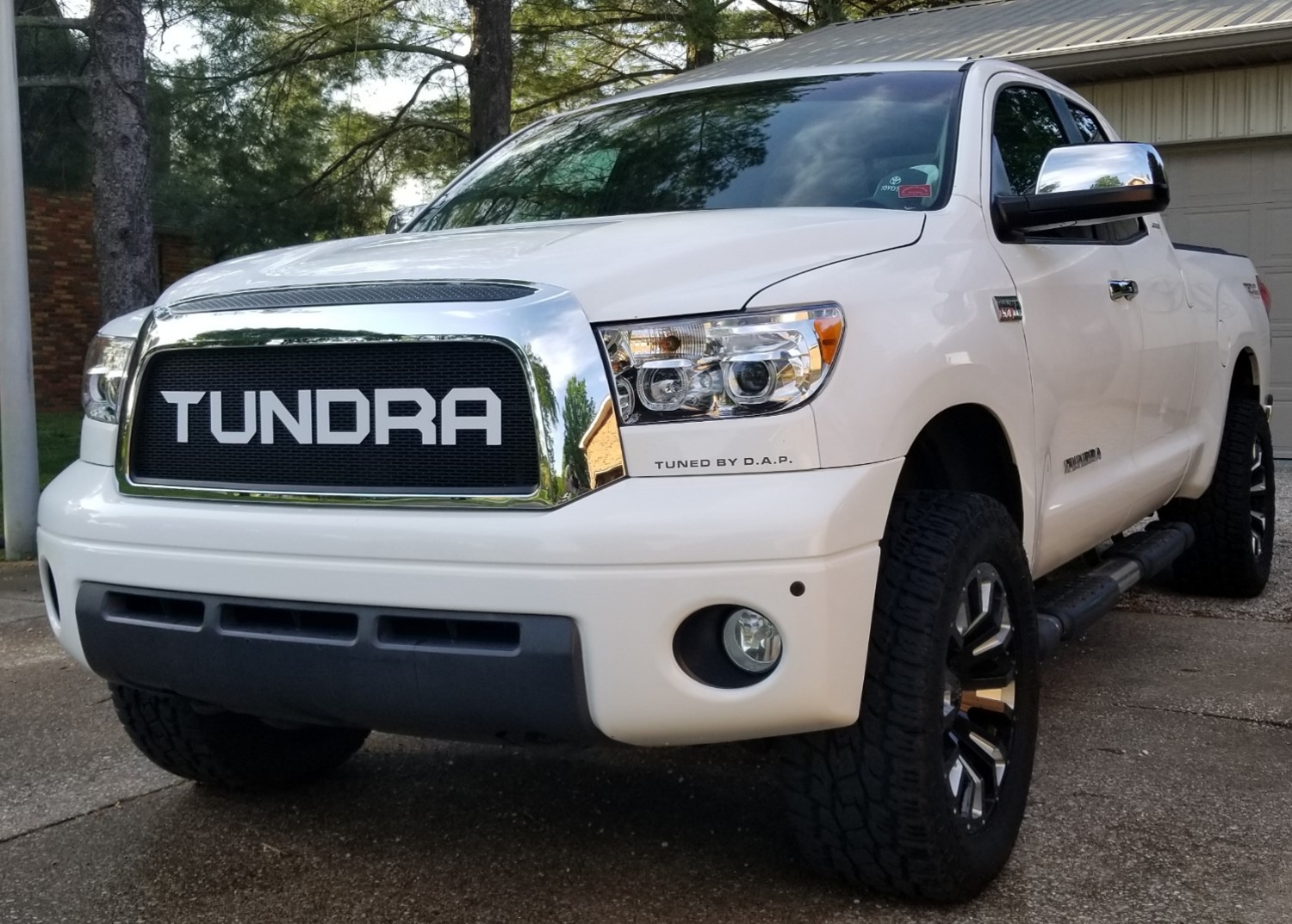 Get the Custom Look: Chrome Frame and Black Mesh Grille with Unique Lettering for Tundra