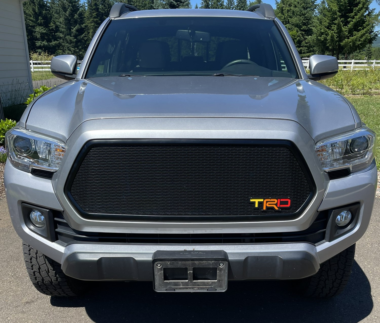 Custom Grille Upgrade: Multicolor TRD Emblem for Toyota Tacoma