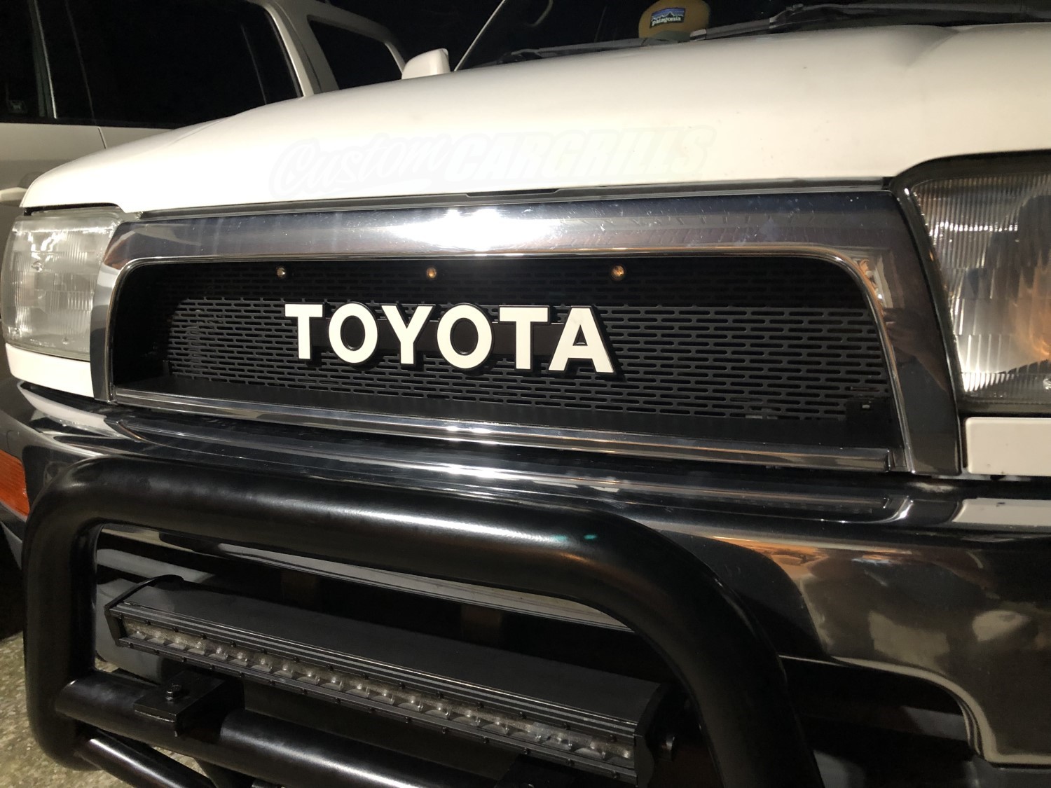 Light It Up: Toyota 4Runner's Amber Light-Enhanced Chrome and Black Mesh Grille