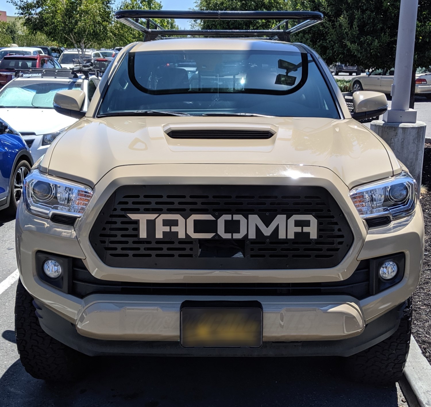 Upgrade Your 2019 Tacoma's Front End with a Custom Black Stainless Steel Grille