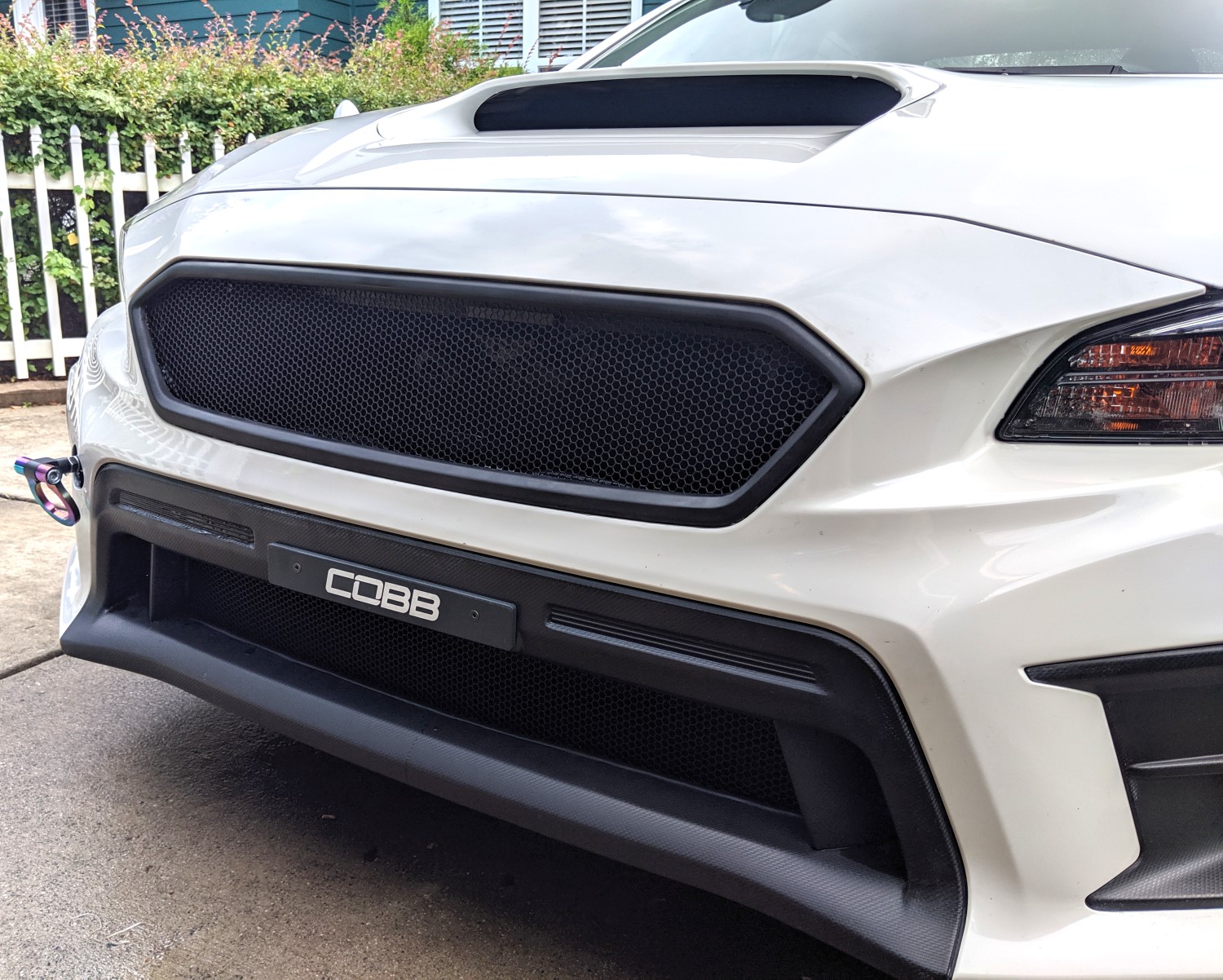 Sleek and Sporty: Custom Black Hexagon Mesh Grille for Subaru WRX