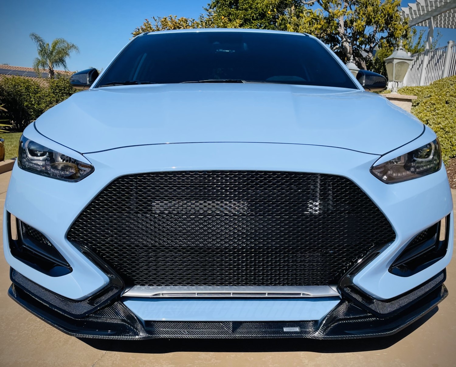 Performance Blue Hyundai Veloster N's Style with a Performance Gloss Black Mesh Grille