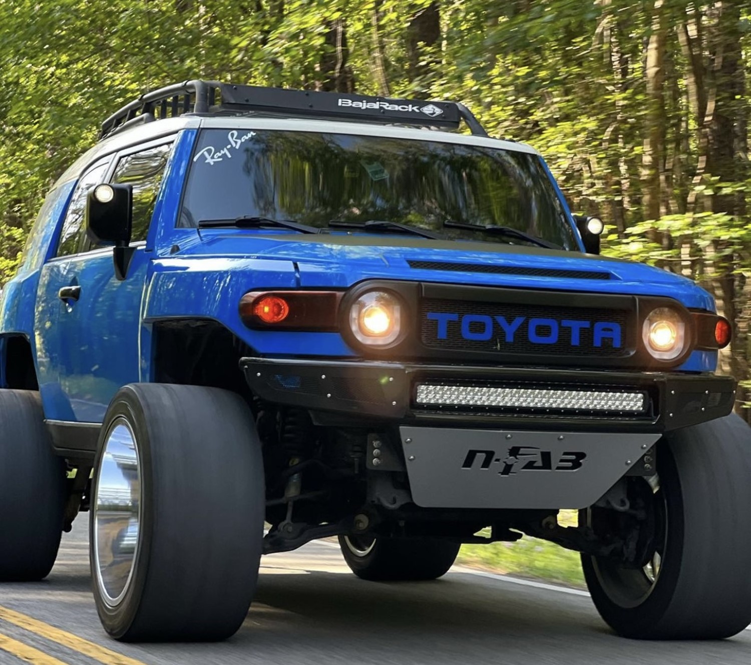 Stand Out with Style: Voodoo Blue FJ Cruiser with Color Matched Grille Letters